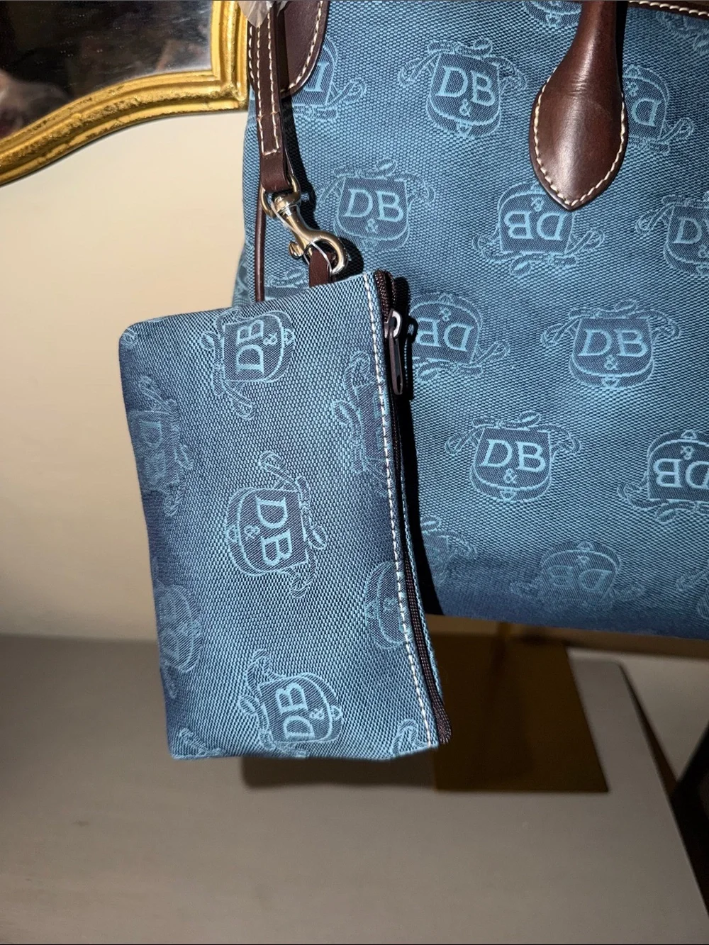 Dooney & Bourke Blue Canvas Duffel with Brown Leather Trim